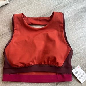 Lululemon high neck sports bra. Never worn, tags still attached. Size 4.